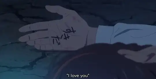 "I love you" written on Mitsuha's hand