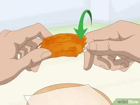 Image titled Eat Chicken Wings Step 4