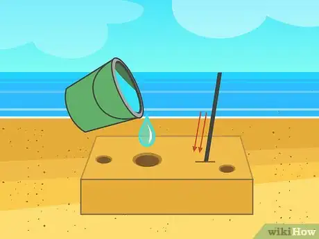 Image titled Build a Big Sandcastle Step 7