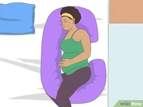 Image titled Lie Down in Bed During Pregnancy Step 9