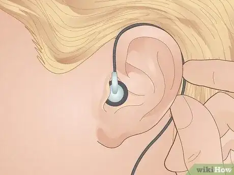 Image titled Keep Earbuds from Falling Out of Your Ears Step 1