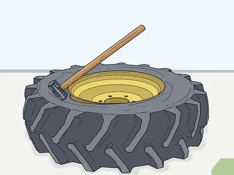 Image titled Remove a Tractor Tire from the Rim Step 6