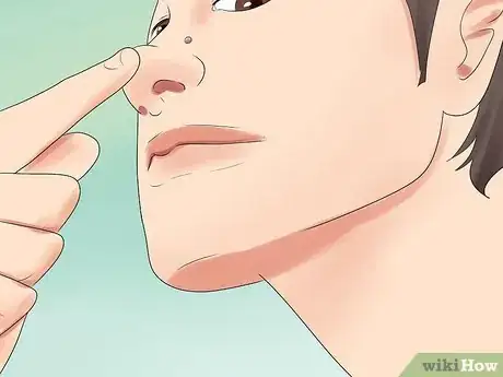 Image titled Take Your Nose Stud in and out of Your Nose Step 15