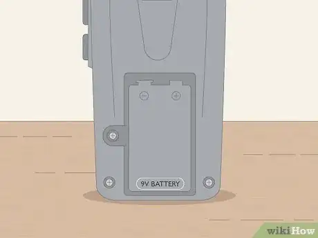 Image titled Put Batteries in Correctly Step 5