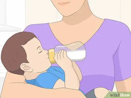 Image titled Get Your Child to Hold Their Own Bottle Step 8