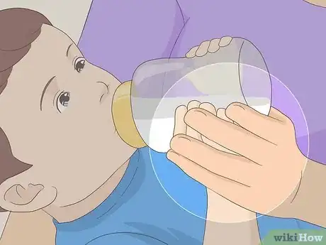 Image titled Get Your Child to Hold Their Own Bottle Step 5