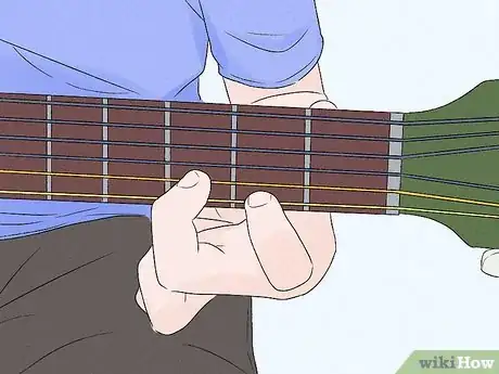 Image titled Play a Bm Chord on Guitar Step 2