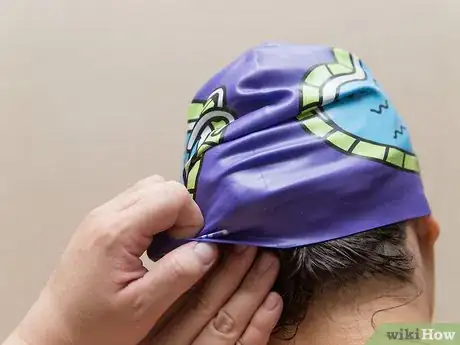 Image titled Put on a Swim Cap Step 13