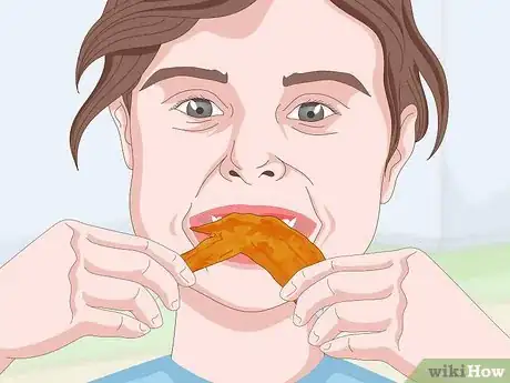 Image titled Eat Chicken Wings Step 10