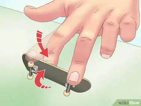 Image titled Kickflip on a Tech Deck Step 6