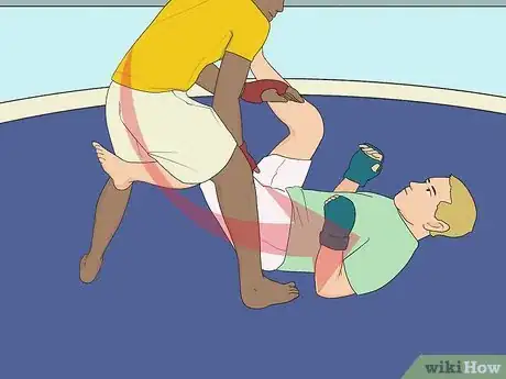 Image titled Do a Single Leg Takedown Step 5.jpeg