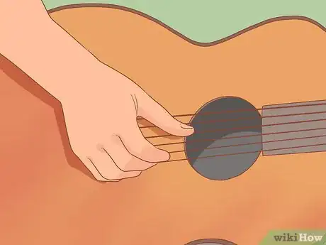 Image titled Finger Pick Step 11