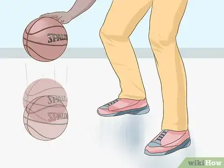 Image titled Pump a Spalding Neverflat Basketball Step 1