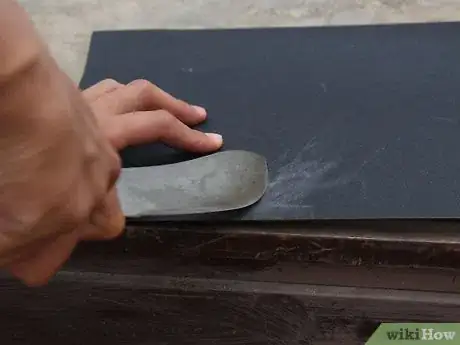 Image titled Sharpen Kitchen Knives with Sandpaper Step 5