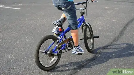 Image titled Ride a Bike With One Hand Step 2