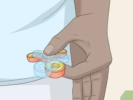 Image titled Do Fidget Spinner Tricks Step 23