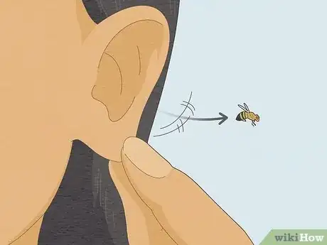 Image titled Remove a Bug from Your Ear Step 1