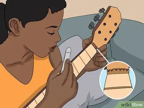 Image titled Adjust Acoustic Guitar Intonation Step 11