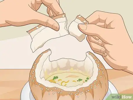 Image titled Eat Soup Served in a Bread Bowl Step 4