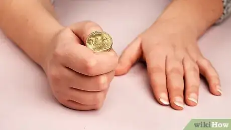 Image titled Do a Simple Coin Magic Trick Step 15