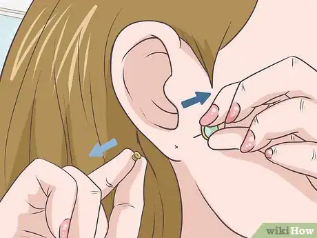 Image titled Remove Earrings Step 2