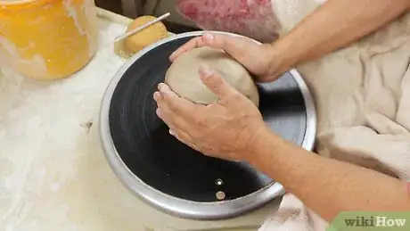 Image titled Make a Clay Pot by Wheel Step 1