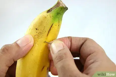 Image titled Slice a Banana Before It Is Peeled Step 6