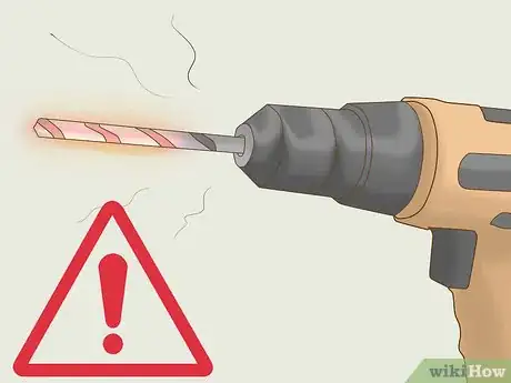 Image titled Use a Drill Safely Step 11