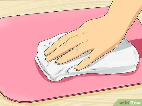 Image titled Clean Place Mats Step 1