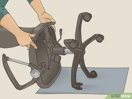 Image titled Clean the Wheels of a Rolling Desk Chair Step 2