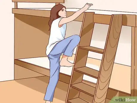 Image titled Get Up to the Top Bunk of a Bunk Bed Step 10