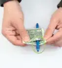 Make a Pen Penetrate a Dollar Bill