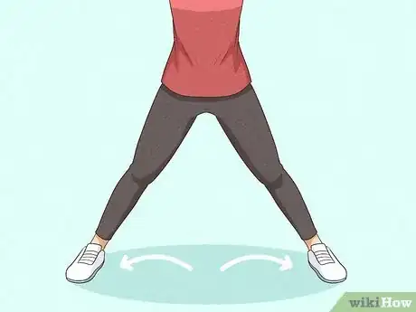 Image titled Perform Jumping Jacks Step 3