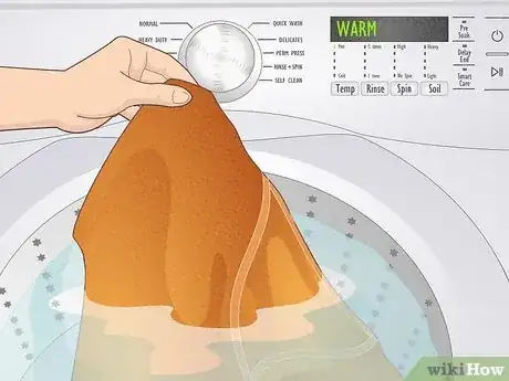 Image titled Get Hair Glue Out of Clothes Step 12