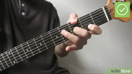 Image titled Play Barre Chords on a Guitar Step 4