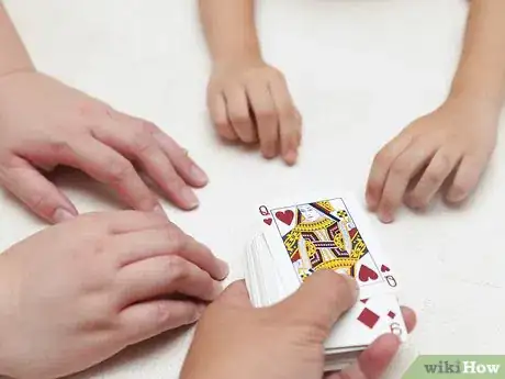 Image titled Play Suck and Blow with Cards Step 2