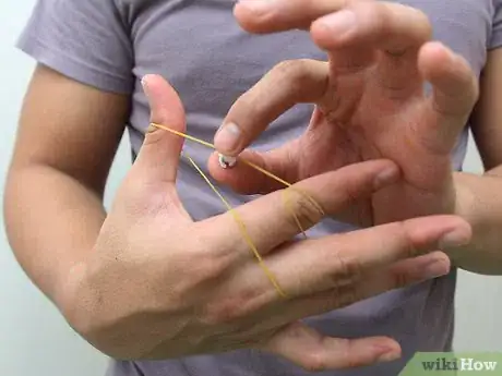 Image titled Make and Shoot Mini Paper Bullets with Rubber Bands Step 17