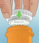 Open a Child Proof Pill Container