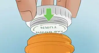 Open a Child Proof Pill Container