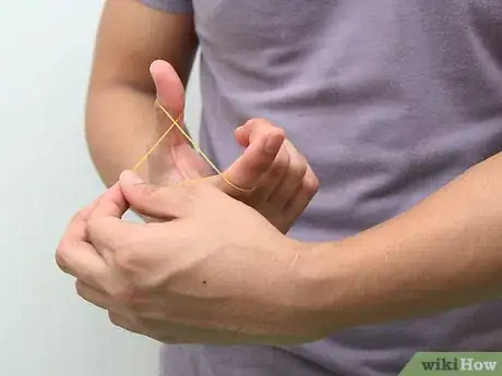 Image titled Make and Shoot Mini Paper Bullets with Rubber Bands Step 15