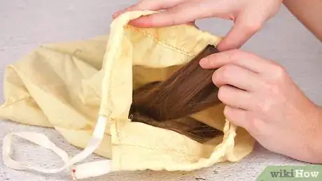 Image titled Store Clip in Hair Extensions Step 2