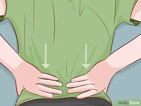 Image titled Massage Lower Back Pain Step 1