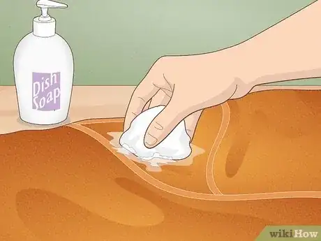 Image titled Get Hair Glue Out of Clothes Step 11