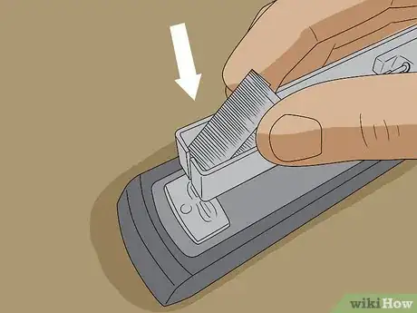 Image titled Fix a Jammed Manual Stapler Step 5