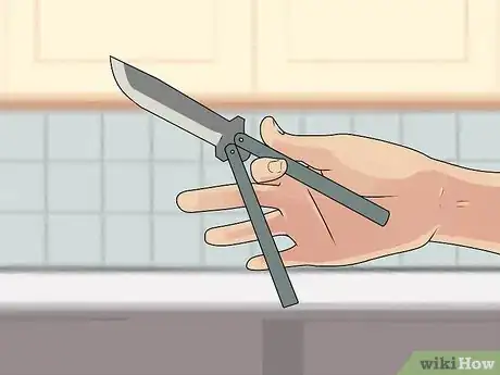 Image titled Perform a Trebuchet with a Butterfly Knife Step 12