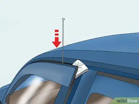 Image titled Use a Coat Hanger to Break Into a Car Step 4