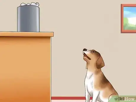 Image titled Teach Your Dog Not to Get Into Garbage Cans Step 1