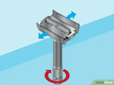 Image titled Remove Blades from a Razor Step 2