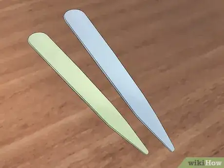 Image titled Use a Bone Folder Step 9