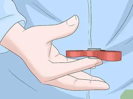 Image titled Do Fidget Spinner Tricks Step 7